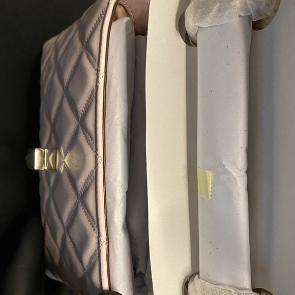 Small chalk pink Natalia cross body bag with tags attached and packaged. - Picture 4 of 6